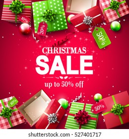 Christmas sale poster with red and green gift boxes with price tags