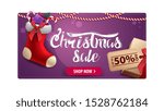 Christmas sale, purple discount card with gift with price tag and Christmas stockings
