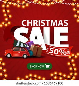 Christmas sale, red discount banner with large letters with red ribbon with offer green button and red vintage car carrying Christmas tree