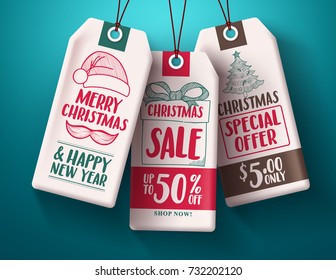 Christmas sale tags vector set in white paper hanging with sale and discount text and hand drawn like santa hat, gift and christmas tree for holiday promotion. Vector illustration.
