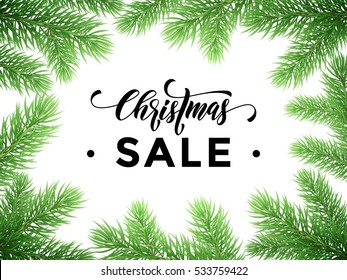 Christmas Sale text on pine tree branches background. New Year sale promotion placard for shop. Calligraphy lettering text. Promo shopping offer banner