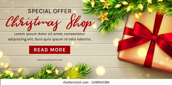 Christmas sale web banner. Wooden background decorated with gift box, Christmas tree branches and garland lights. Top view. Vector template.