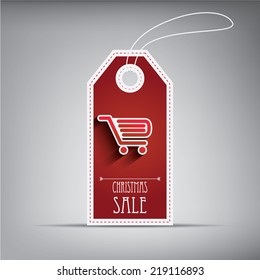 Christmas sales tag with shopping cart. Eps10 vector illustration.