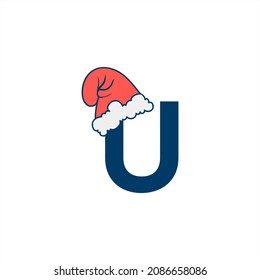 Christmas Santa hat wearing letter U logo design