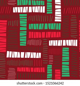 Christmas seamless abstract vector background green red geometric hand drawn abstract rectangle block shapes. Repeating pattern paper cut out collage style. Modern abstract Christmas holiday design.