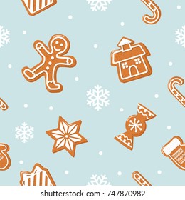 Christmas seamless background. Gingerbread man, house, candies on pastel blue.