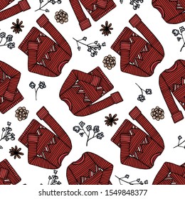 Christmas seamless background with knitted sweaters, fir cones. Design for Wallpaper, gift paper, patterns, textiles, Christmas and new year greeting cards.