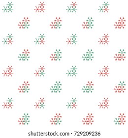 Christmas seamless background with random scatter falling red and green snowflakes isolated on white.