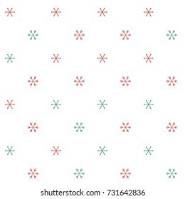 Christmas seamless background with random scatter falling red and green snowflakes isolated on white.