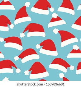 Christmas seamless background with red Santa hats. Vector