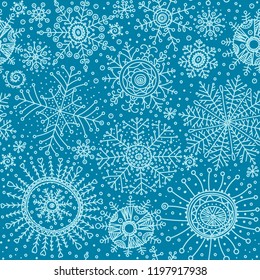 Christmas seamless background. Winter seasonal symbols pattern. Doodle snowflakes wallpapers. Snow flakes ornament.