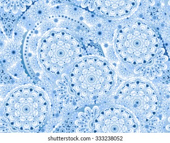 Christmas seamless blue pattern with white snowflakes and paisley (vector)