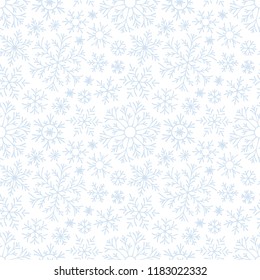 Christmas seamless doodle pattern with snowflakes.