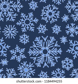 Christmas seamless doodle pattern with snowflakes.