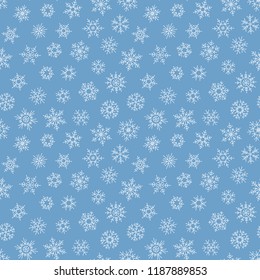 Christmas seamless doodle pattern with snowflakes.