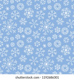 Christmas seamless doodle pattern with snowflakes.
