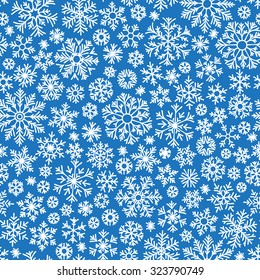 Christmas seamless doodle pattern with snowflakes, vector background