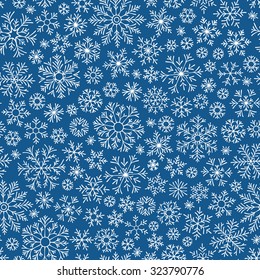 Christmas seamless doodle pattern with snowflakes, vector background