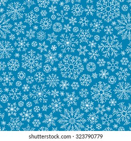 Christmas seamless doodle pattern with snowflakes, vector background