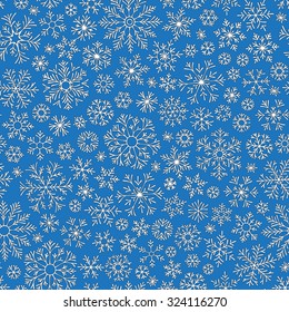 Christmas seamless doodle pattern with snowflakes, vector background
