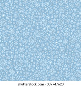 Christmas seamless doodle pattern with snowflakes, vector background
