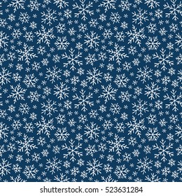 Christmas seamless doodle pattern with snowflakes, vector background