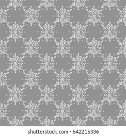 Christmas seamless doodle pattern with snowflakes. Vector illustration