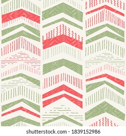 Christmas seamless pattern from abstract geometric Christmas trees for greeting cards, wrapping paper. Seamless pattern with zigzag stripes. Abstract geometric texture. Vector illustration.