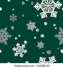 Christmas seamless pattern. Background with silver snowflakes.