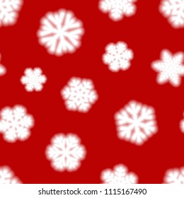 Christmas seamless pattern of big blurry snowflakes, white on red background