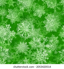 Patrón ininterrumpido de Navidad de grandes copos de nieve complejos en colores verdes. Fondo invernal con nieve en caída