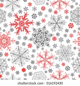 Christmas seamless pattern of big and small snowflakes, red and gray on white