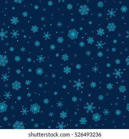 Christmas seamless pattern with blue snowflakes on dark blue background