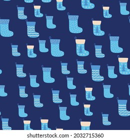 Christmas seamless pattern with blue Christmas socks. Christmas, New Year illustration
