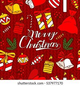 Christmas seamless pattern with candies, bell, bag, ball, bow, and gift. Seamless vector  pattern with Merry Christmas lettering on the knitted background.