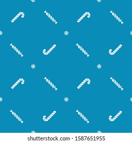 Christmas seamless pattern with Christmas candies on blue background. Vector illustration. New Year pattern. For web design, wrapping paper, scrapbooking, for printing on textile, cups, package.