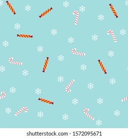 Christmas seamless pattern with candies and snowflakes on blue background. Vector illustration. For greeting cards, web, wallpaper, wrapping paper, scrapbooking, for printing on clothes, package.