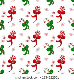 Christmas seamless pattern with candy cane, lollipop and peppermint candy. Xmas festive pattern in red, green and white colors with candies isolated on background.