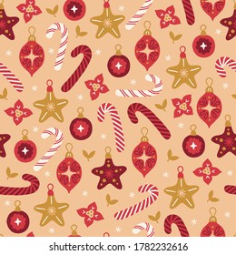 Christmas seamless pattern with candy cane, stars, flowers, snowflakes, bauble on gold background. Perfect for winter holidays, New Year greetings, gift paper, wallpaper