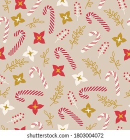 Christmas seamless pattern with candy cane, flowers, leaves, branches on beige background. Perfect for winter holidays, gift paper, wallpaper, New Year greeting cards. Vector illustration 