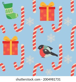 Navidad sin fisuras con bastón de caramelo, regalo, caldo de leña, ave de bullfinch. Papel de envoltura de Navidad