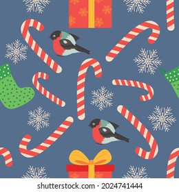 Christmas seamless pattern with candy cane, gift, stocking, bullfinch bird. Christmas wrapping paper.