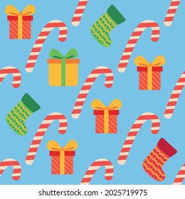 Christmas seamless pattern with candy cane, gift, stocking. Christmas wrapping paper.