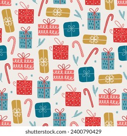 Christmas seamless pattern with candy cane, presents, fir branches and snowflakes on white background. Perfect for wallpaper, gift paper, winter greeting cards. Vector illustration