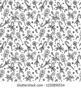 Christmas seamless pattern with candy canes and lollipops. Hand drawn doodle style. Black and white vector illustration. Isolated on white background. Perfect for wrapping paper and coloring pages