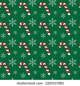 Weihnachten nahtloses Muster mit Süßigkeiten und Schneeflocken auf grünem Hintergrund. Zum Verpacken von Papier, Stoffdruck, Grußkartendesign