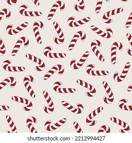 Christmas seamless pattern with candy canes. Vector illustration.