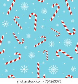 Christmas Seamless Pattern With Candy Canes, Snowflakes, Snow Ball On Blue Background. Background For Wrapping Paper, Fabric Print, Greeting Cards. Winter Holiday Design.