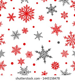 Christmas seamless pattern of complex big and small snowflakes in red and gray colors on white background