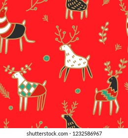 Christmas seamless pattern. Cute colorful reindeer are walking among the branches and berries. Festive ornament in red and gold tones. Hand drawing illustration. Merry Christmas and Happy New Year!